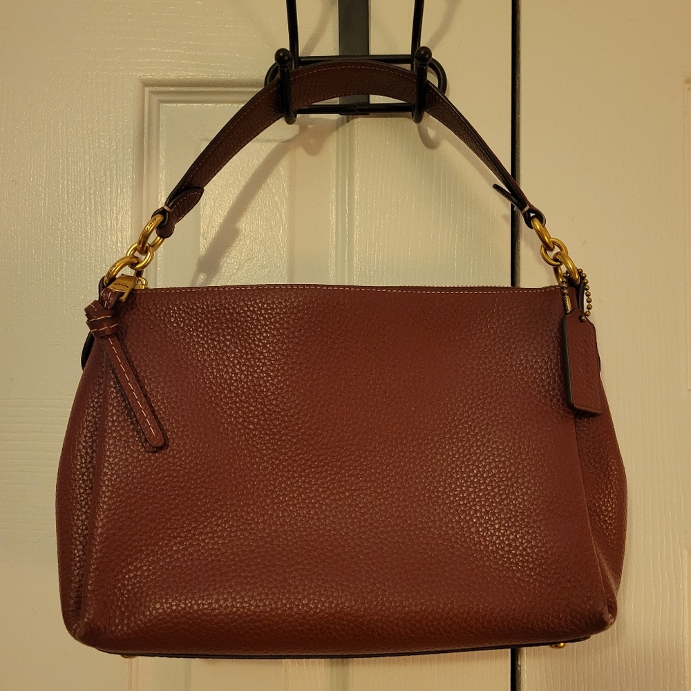 Burgundy Shay Coach purse with gold hardware